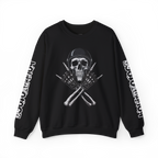 Black Outlaw Skull Moto Crewneck Sweatshirt worn by a bearded man with a relaxed fit. Features a bold skull graphic with crossed wrenches, designed for riders and streetwear enthusiasts.