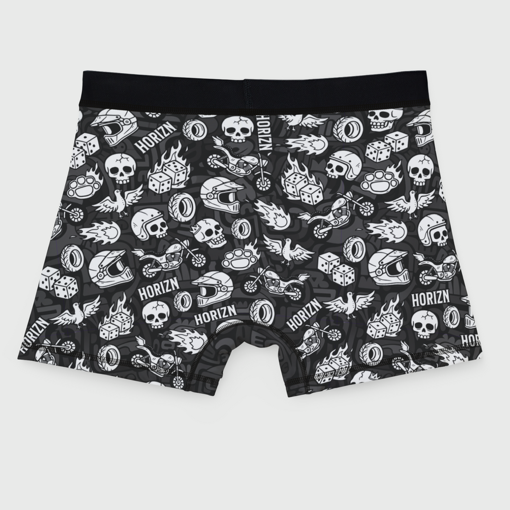Grey moto graphic boxer briefs with skulls, flames, and helmets, featured on a male model showcasing comfort and style for riders