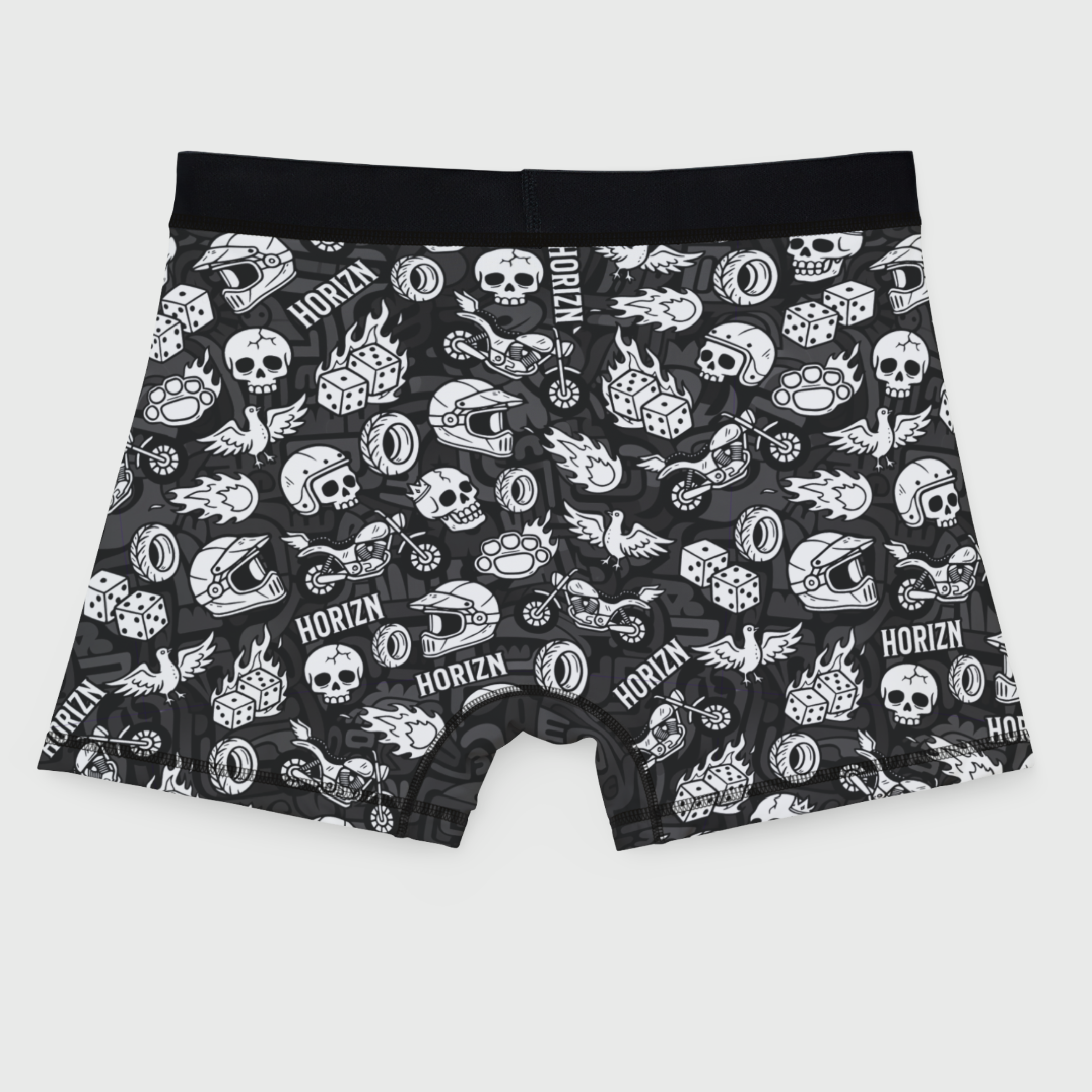 Grey moto graphic boxer briefs with skulls, flames, and helmets, featured on a male model showcasing comfort and style for riders