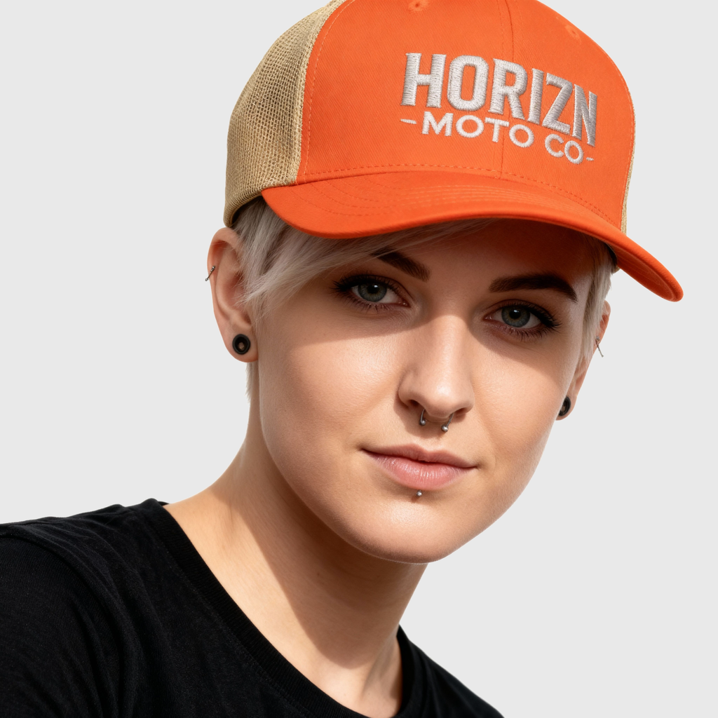Orange Mesh Moto Trucker Cap with embroidered HORIZN MOTO CO logo, featuring a bold orange front and breathable tan mesh back, perfect for riders and urban creatives.