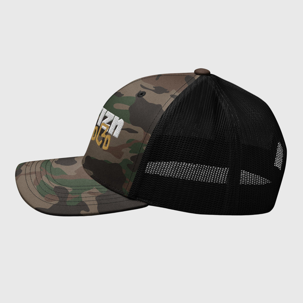 Camo Mesh Trucker Cap with structured front and breathable mesh panels, featuring white 'HORIZN' logo and gold 'MotoCo' graphic, ideal for riders and urban explorers.