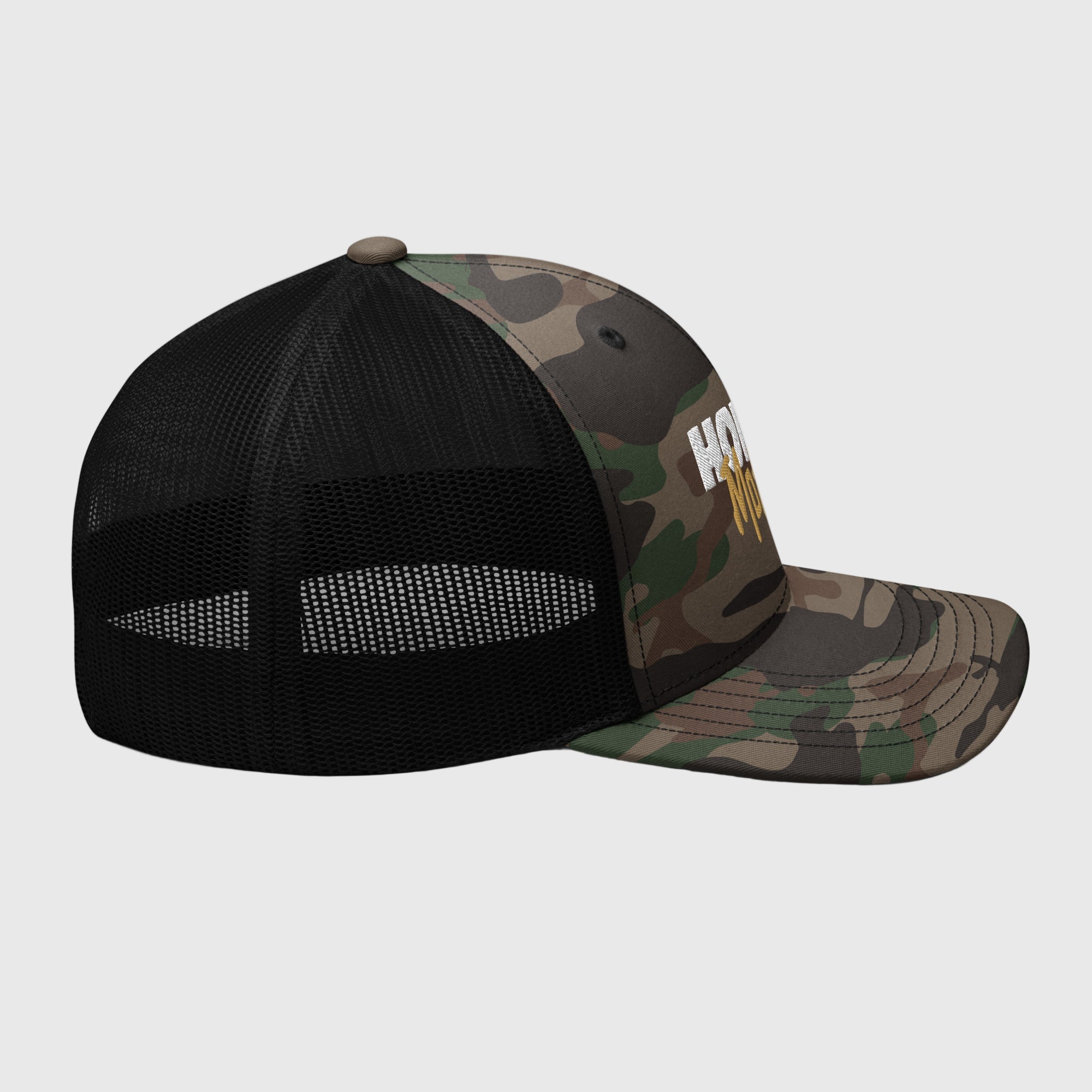 Camo Mesh Trucker Cap featuring white 'HORIZN' logo and gold 'MotoCo' graphic, designed for riders and city drifters, with structured front panel and breathable mesh rear.