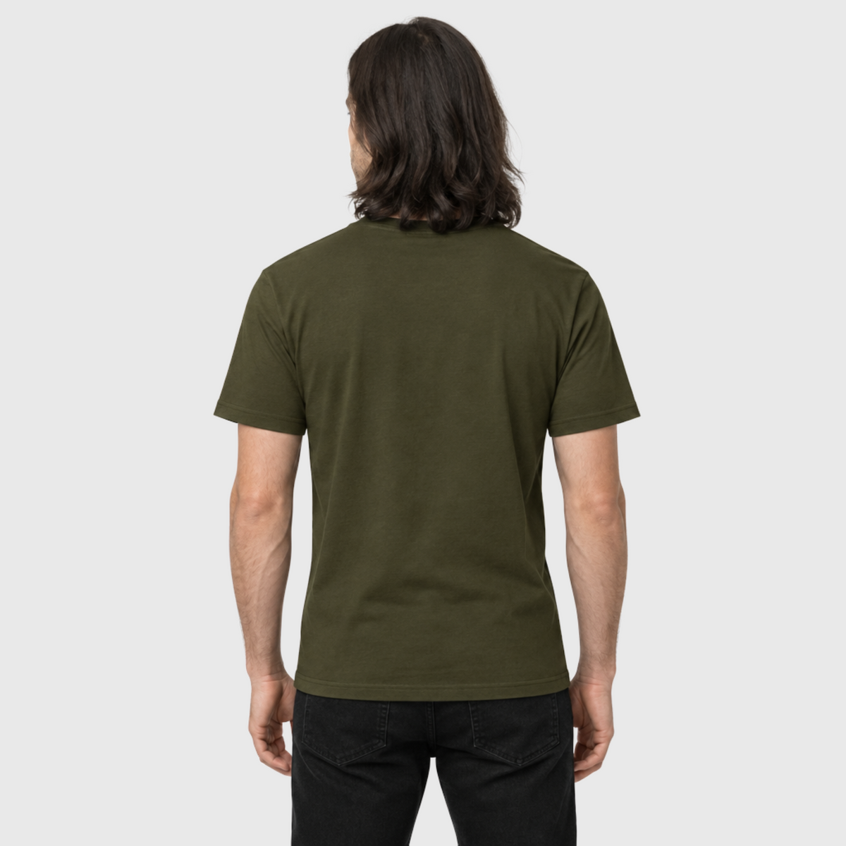 Rear view of a model wearing the Army Chase the HORIZN Aviator Skull Tee, showing its plain back and crew neck.