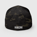 Rear view of the Multicam Black camouflage Chase the HORIZN Flexfit cap, showing the small white HORIZN embroidery at the back.