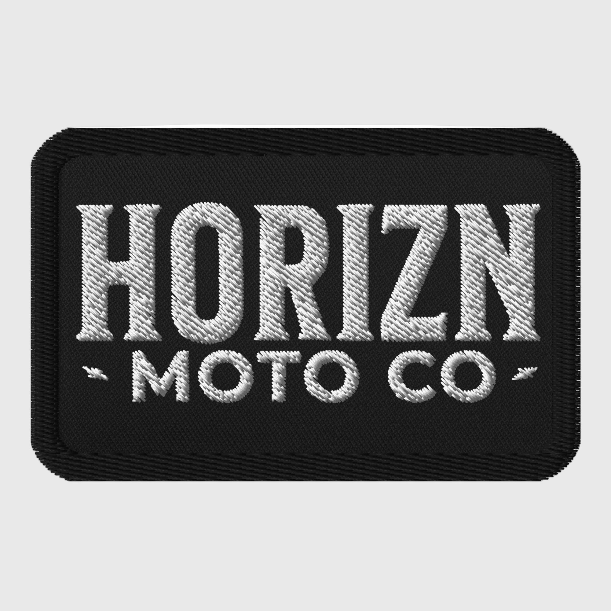 HORIZN MOTO embroidered patch showcasing bold lettering on black twill fabric, perfect for custom outfit embellishments.