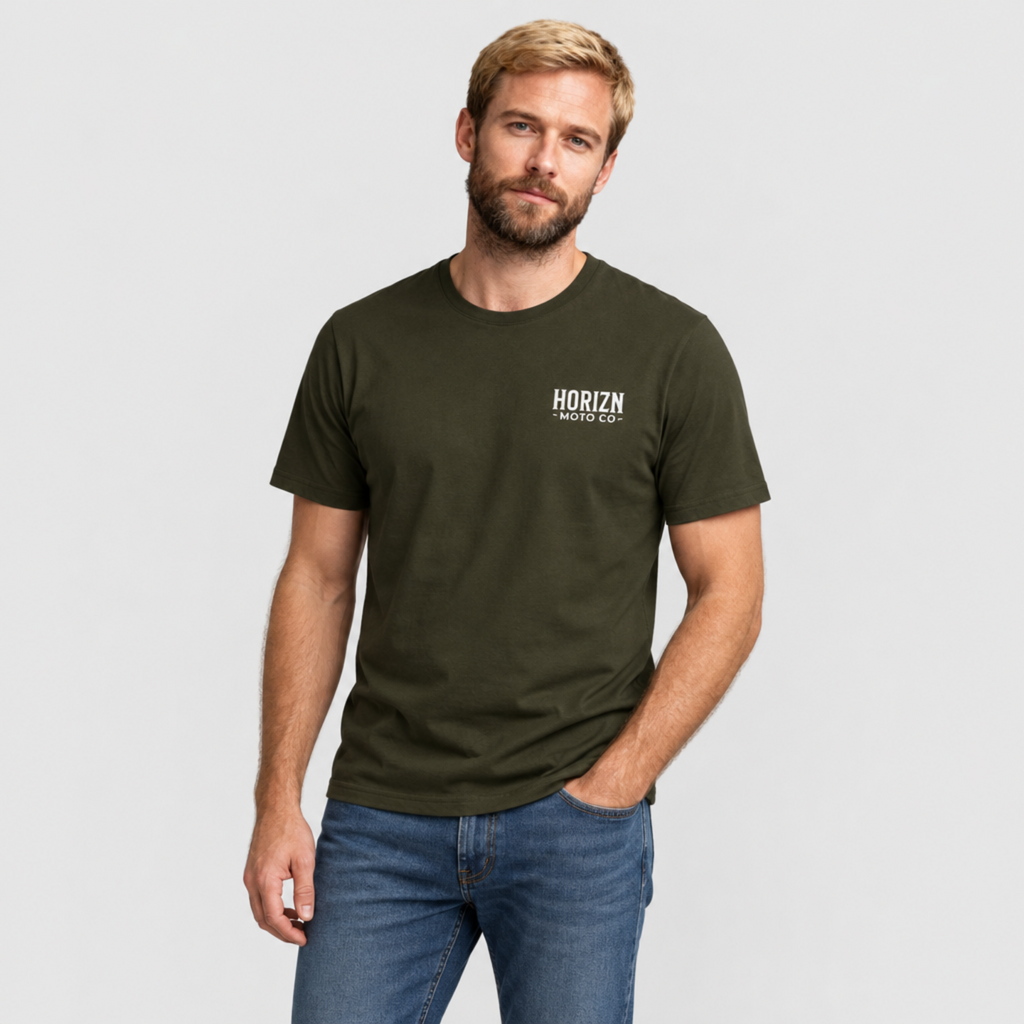 Man wearing the Army HORIZN MOTO CO. Basics Tee, front view showing the small chest logo.