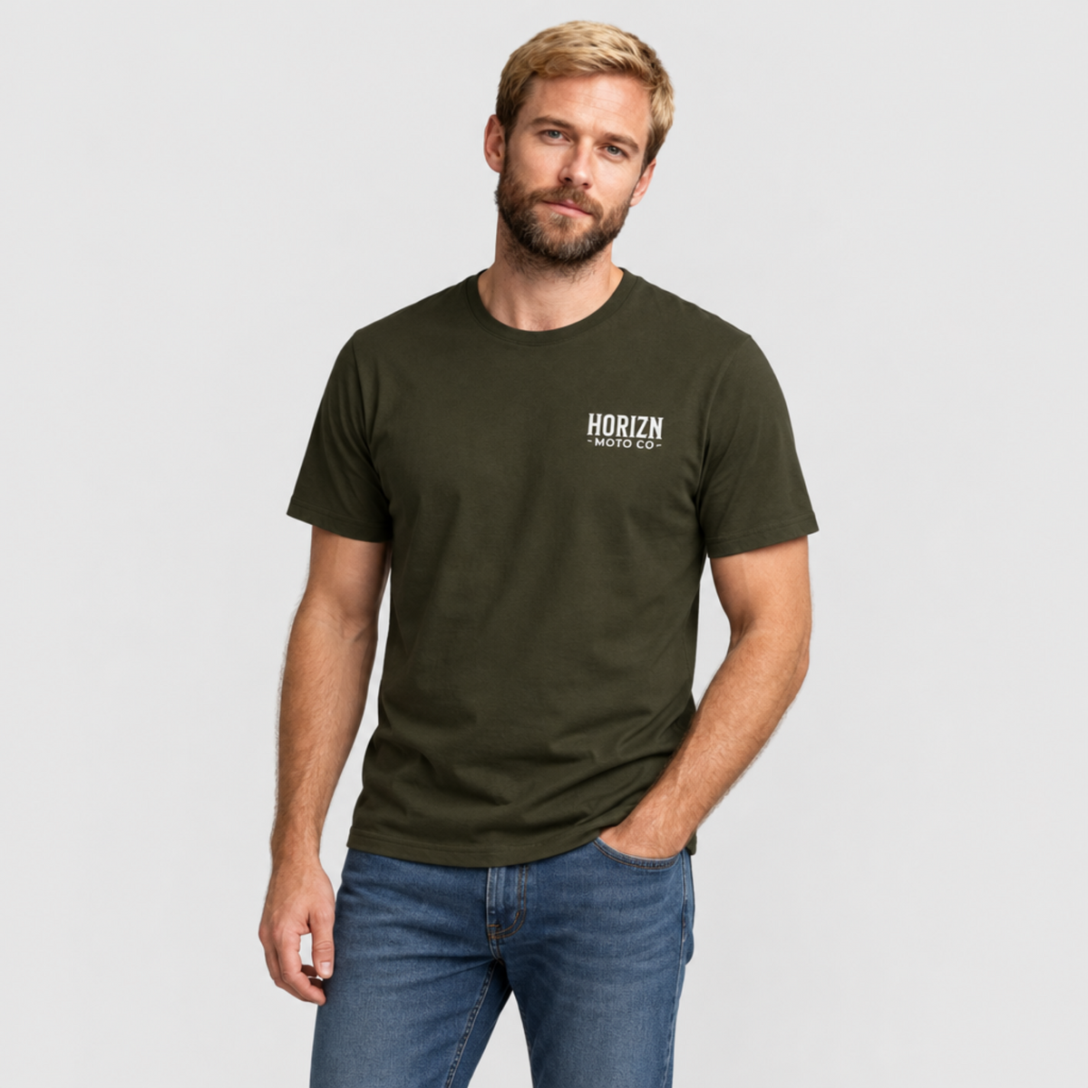 Man wearing the Army HORIZN MOTO CO. Basics Tee, front view showing the small chest logo.