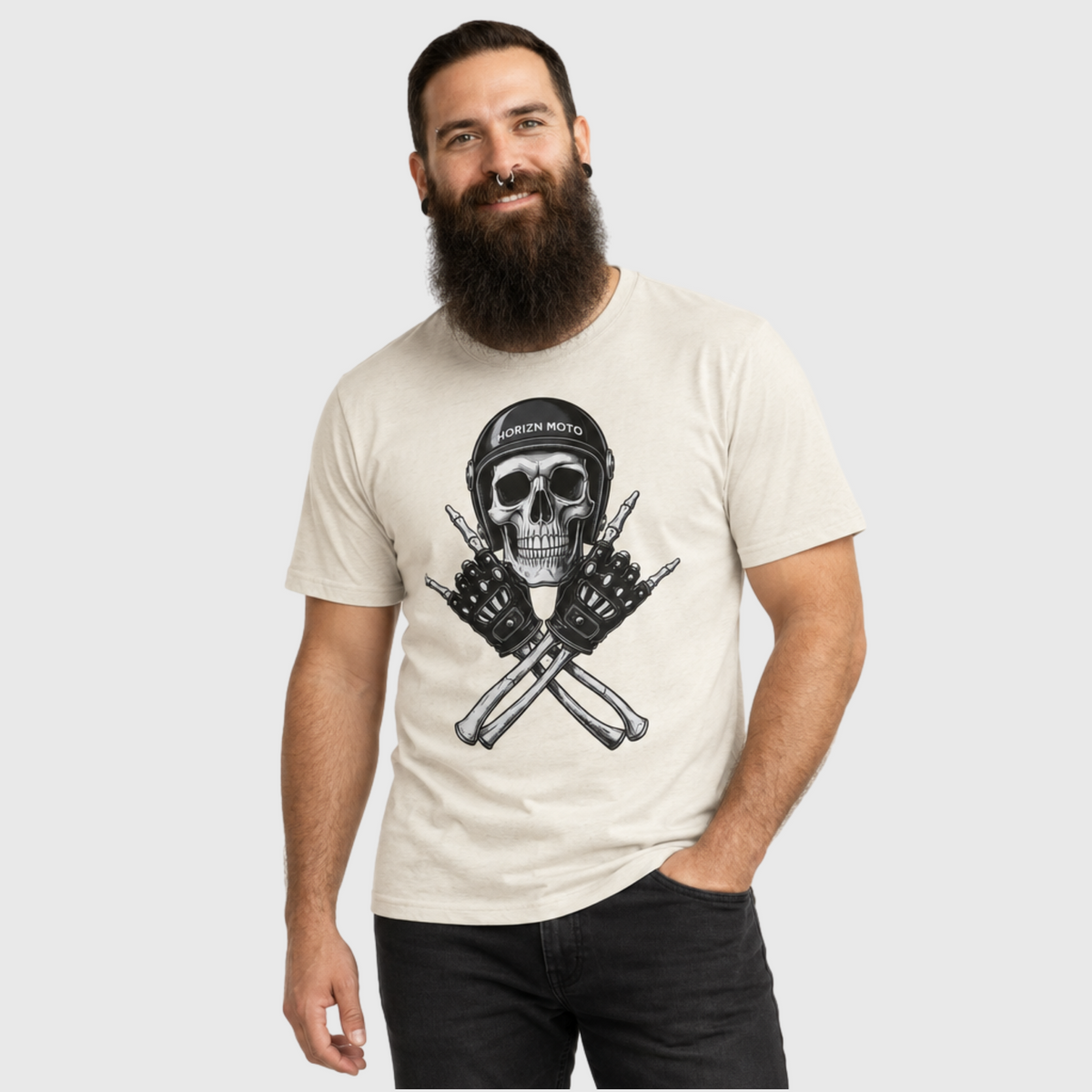 Model wearing the natural Rebel Bones Moto Tee with skull helmet and crossed biker gloves graphic.